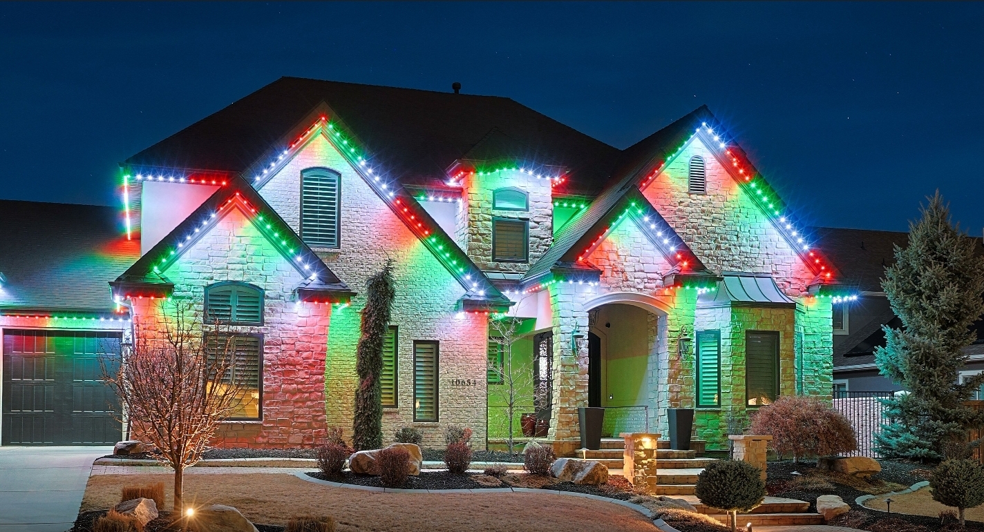 Red and white Christmas holiday lighting on home exterior